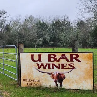 a sign for u bar wines