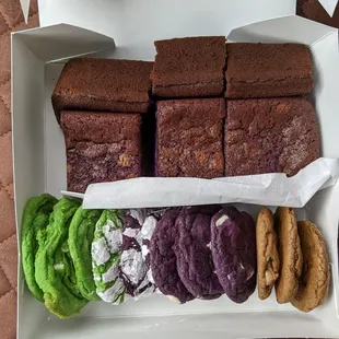 Ube butter Mochi and cookies! (From left to right is pandan, pandan crinkle, ube crinkle, ube cookie and coffee cookie)!
