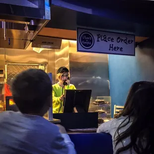 a man and a woman in a restaurant