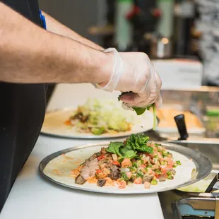 a person preparing food in a kitchen