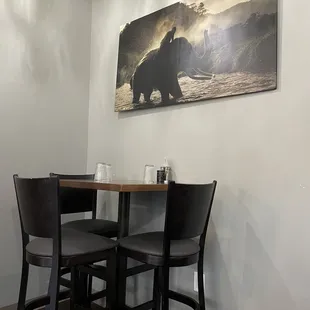 a table and chairs in a restaurant