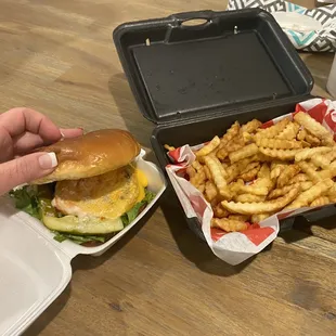 Classic burger with cheese, side of fries with all the fixings to get loaded up!