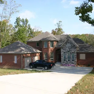 a house with a car parked in front of it