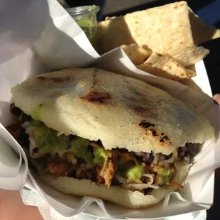 Pork Arepa w/ Black Beans, Cheese and their Award-Winning Green Salsa! DELICIOUS.