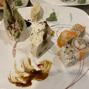 California roll, snow crab roll, and a large roll with soy paper