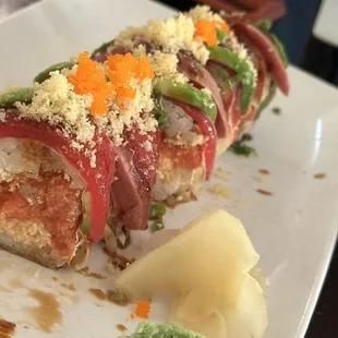 a close up of a sushi roll on a plate