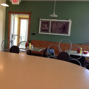 a table and chairs in a restaurant