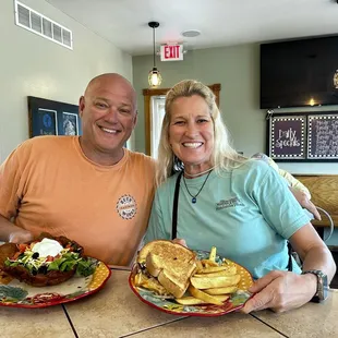 Happy Couple Ready to Chow Down