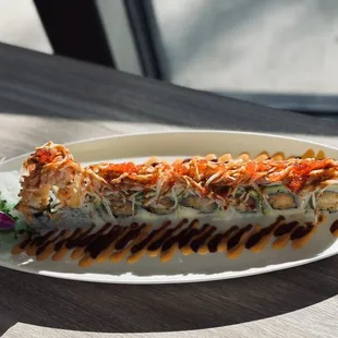 a piece of sushi on a plate