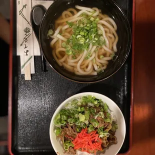 a bowl of noodles and a bowl of soup