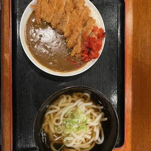 a bowl of soup and a bowl of noodles