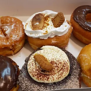 Selection of six vegan raised donuts, including tiramisu, banana creme, Boston creme ($18). Best vegan donuts in the Twin Cities.