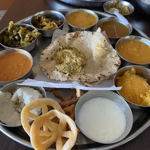 a plate of indian food on a table