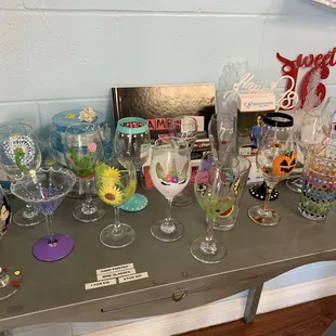 a table full of glassware