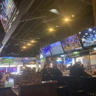 people sitting at the bar