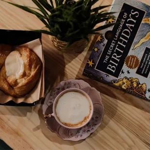 a cup of coffee and a book