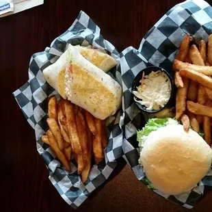 Crab cake sandwich and tuna salad wrap