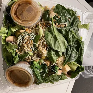 a salad in a plastic container