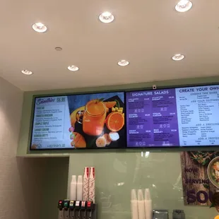 menus on a large screen in a restaurant
