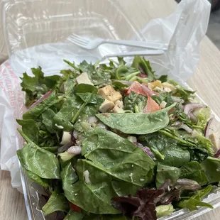 Build-your-own salad. Spring mix, spinach, strawberries, apples, blue cheese crumbles, and red onion with balsamic vinaigrette.