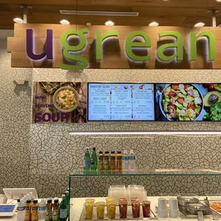 a counter with a variety of food items