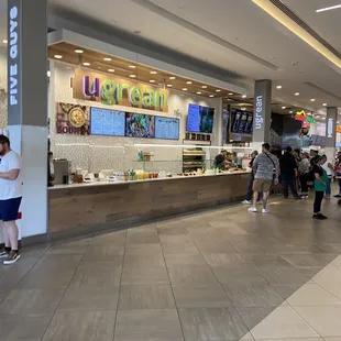 a group of people in a mall