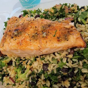 Custom salad with a generous piece of salmon