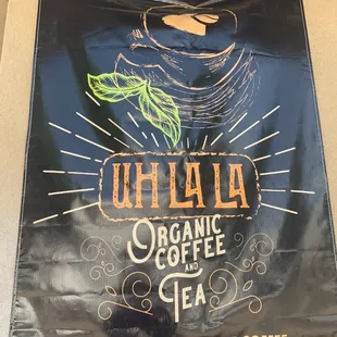  a sign for the art and blessing of coffee