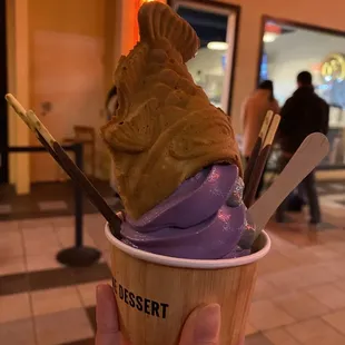 person holding a cup of ice cream