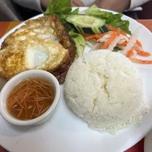 Rice plate, with grilled pork which was covered by the egg