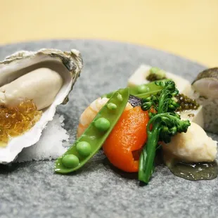 Seasonal Appetizer:chef's daily creation of bite-sized starters featuring seafood, sesame tofu, paprika, beets, broccolini &amp; sugar snap peas