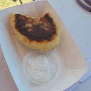an english muffin with a side of sour cream