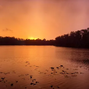 Sunset at the lake in the back.