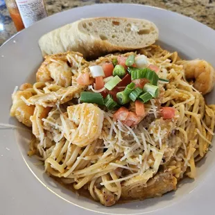 Cajun pasta with chicken  and shrimp .