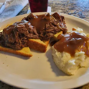Open-faced pot roast and mashed taters.