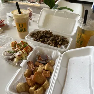 Deep fried combo, popcorn chicken, rice paper rolls, peach tea, roasted coconut milktea