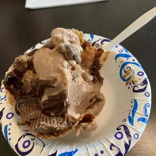 Chocolate waffle bowl with hot fudge and Reese cup