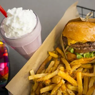 a hamburger and fries in a basket