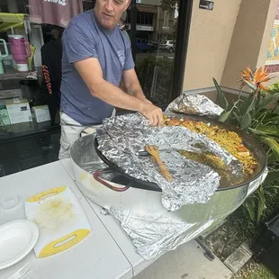 Grand Opening Special! Andres serving up authentic paella,taste of Espana!