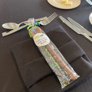 Orders custom pretzel sticks. I added the stickers myself.