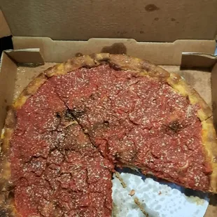 a deep dish pizza in a box