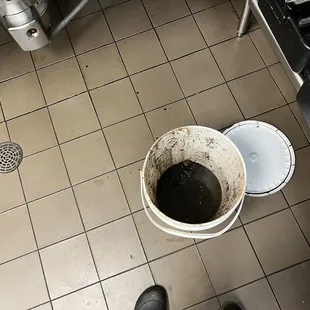 a dirty bucket of water