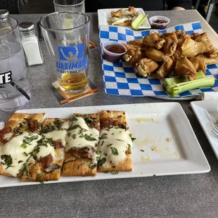 Flatbread pizza and wings.
