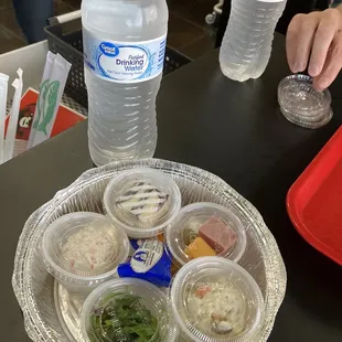 Complimentary dishes and water bottle