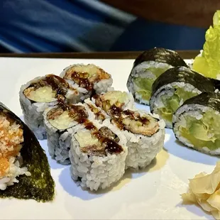 Spicy Salmon Hand Roll, Salmon Skin Roll, and Veggie Combo Roll