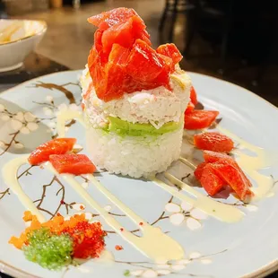 a plate of sushi on a table