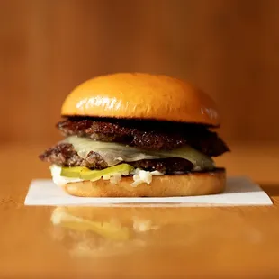 a hamburger on a piece of paper