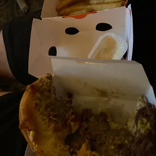 Burger with all the onions I didn't order scrape off. Child size fries.