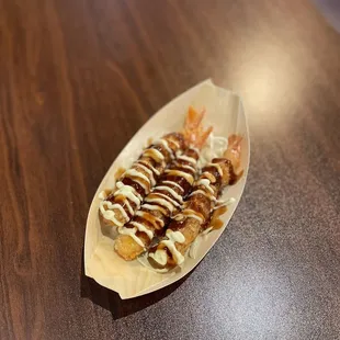 Ebi Appetizer   Panko shrimp dressed with mayo and katsu sauce.