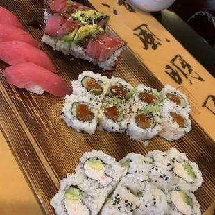 Lunch hour special rolls...tuna nigiri, California roll, spicy tuna roll and atomic roll